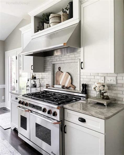 herringbone backsplash behind stove.